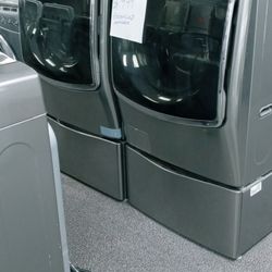 SET UNITS LG WASHER AND DRYER WITH PEDESTALS STAINLESS INCLUDING WARRANTY SMALL FEE DELIVERY