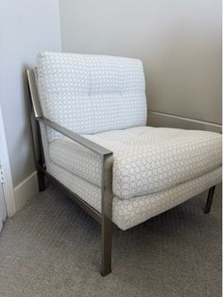 2 Like New modern and sleek, accent chairs