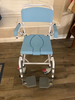 Shower wheelchair with commode