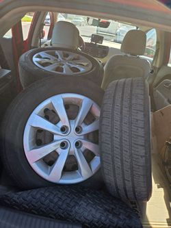 Rims and tires 15" wheels.  4x100.  Fits older honda civic, Toyota corolla, scion, kia, Español ok!!
