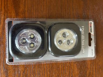Sontax LED puck lights peel and stick two pack NIP batteries included