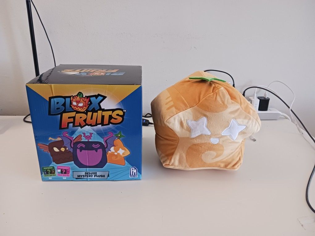 Roblox Blox fruits deluxe mystery plush New.
Only 10 dollars (on sale at Hot Topic for 40 dollars).
And I gift a New big Glade Candle and a house dec