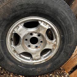 5 Matching LT265/75R16 Tires on 16x7 GM Rims – Includes Spare