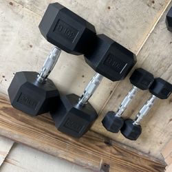 New pair of 5 and 30lb rubber dumbbells $70