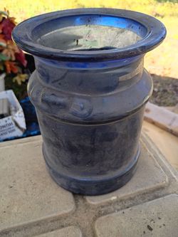 A Blue Vintage Milk Container Glass