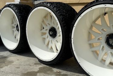 Chevy and ford 26x14 rims and tires fire deal