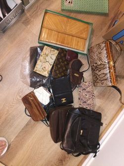 Various purses, hand bags, and coin purses