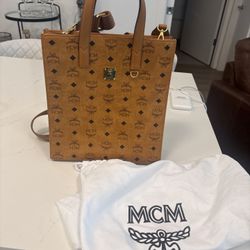 Authentic MCM Visetos Tote Bag in the iconic cognac color.