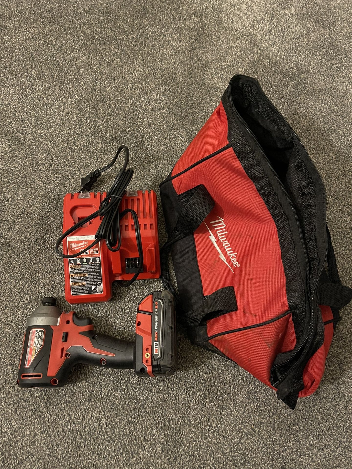 Milwaukee Impact Drill with Battery And Charger