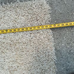 Large Cream Color Rug Needs Cleaning