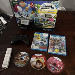 Nintendo Wii U On Box With Games