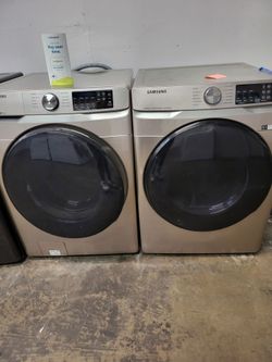 SAMSUNG SET STEAM WASHER AND GAS DRYER