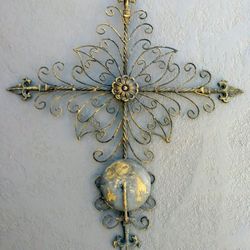 Pair of metal candle wall sconces.