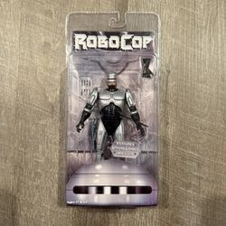 In Hand, Brand New, Never Opened 2012 - NECA - Robocop - Robocop with Spring-Loaded Holster - 25th Anniversary - 7” Inch Action Figure
