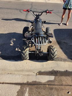 Kids 110 quad with bran new motor