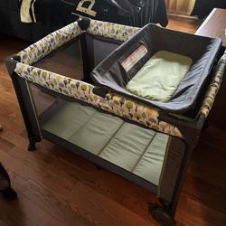 Portable Playpen With Bassinet Feature