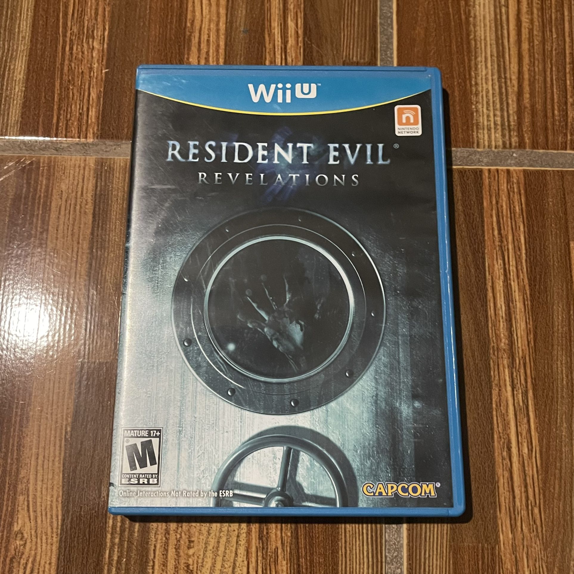Resident Evil Revelations (Nintendo Wii U, 2012) CIB Complete TESTED WiiU