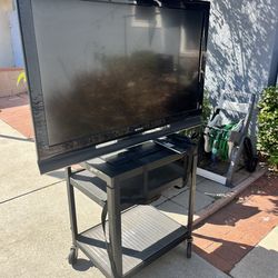 Sony Bravia 50” TV on rolling electric cart.