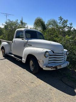 Vintage 1953 Chevrolet Truck with a Split Windshield.