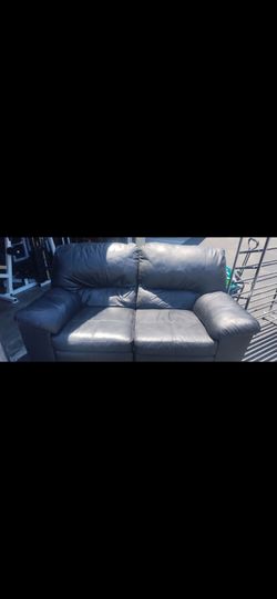 Black faux leather sofa