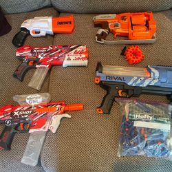 9 Nerf Guns 