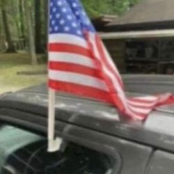 Show your patriotism. New car flags.  Clips right on your car window. How many do you want