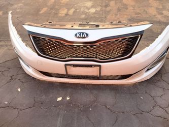 2013-2015 Kia Optima complete front bumper with all the accessories and inner fillers with accessories OEM.