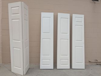 White Raised Panel Bifold Closet Doors