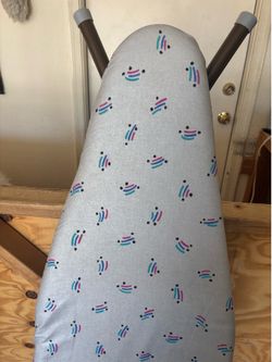 Ironing board with like new cover