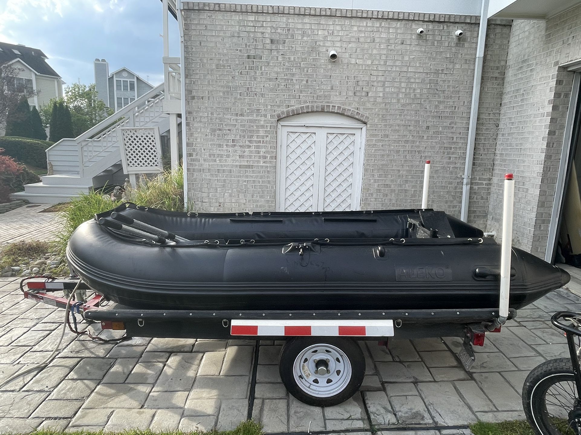 10.5 ft boat with custom trailer