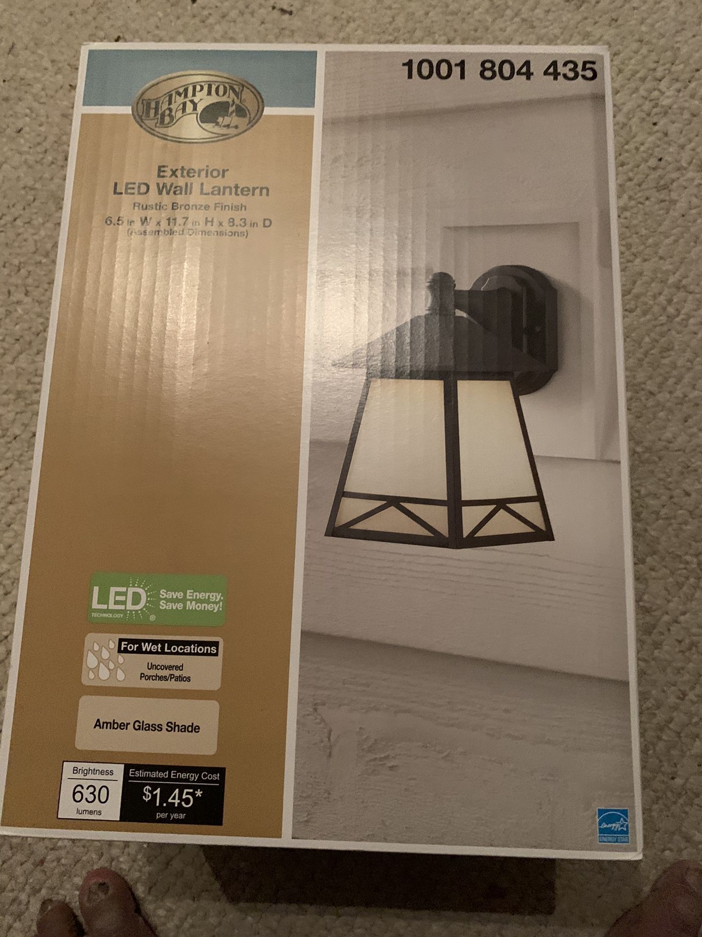 Price Reduced - Brand New 6.5” W x 11.7” H x 8.3” D Hampton Bay Exterior LED Wall Lantern with Amber Glass Shade