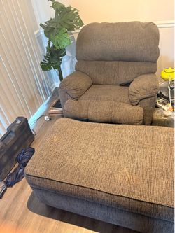 Grey recliner chair, with trunk