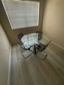 Glass Table With Four Chairs