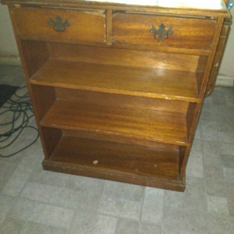 Antique solid oak bookshelf with 2 drawers at the top. Very heavy solid and sturdy piece of furniture