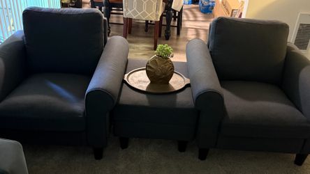 Two gray dark armchairs