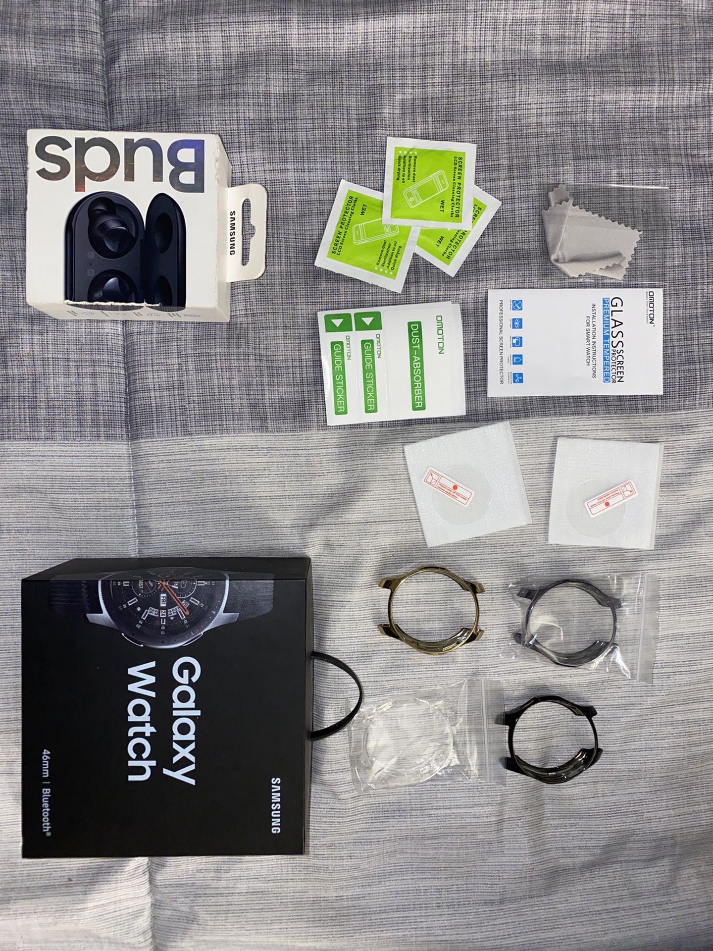 Samsung Buds and Samsung galaxy Watch 46mm with accessories
