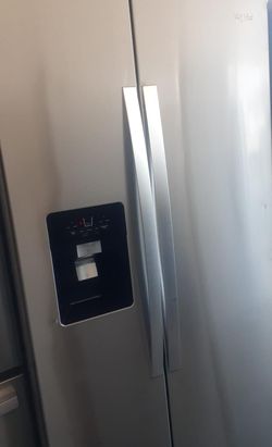 Whirlpool Side By Side Stainless Steel Fridge
