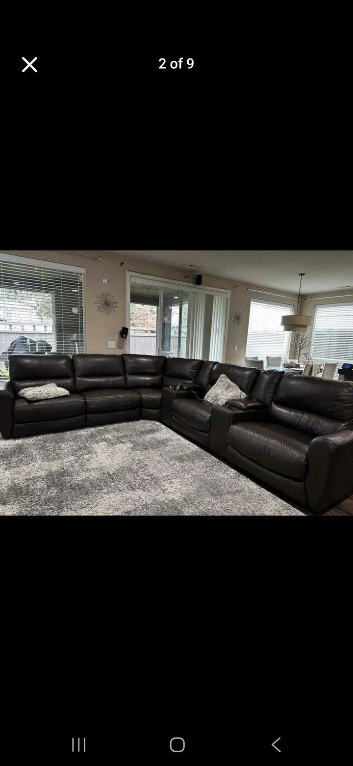 Danvors 7 Pc Leather Sectional with 4 Power Recliners and 2 USB Consoles.
Brand: Macy's