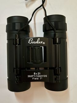 Small black binoculars with case