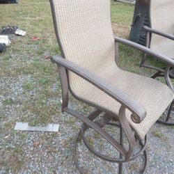 2 Swivel Bar Stools 