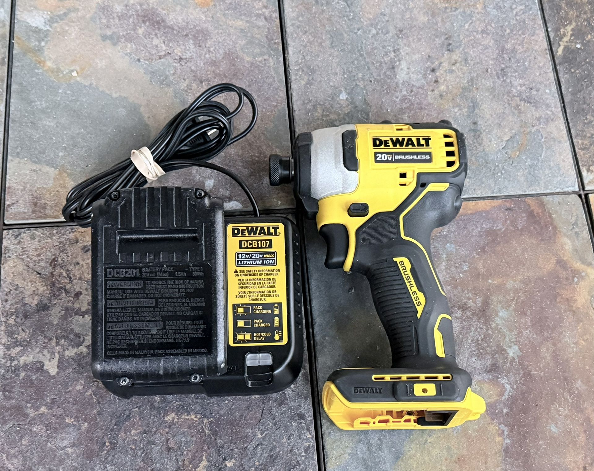 DEWALT ATOMIC 20V MAX Cordless Brushless Compact 1/4 in. Impact Driver With Battery And Charger. 