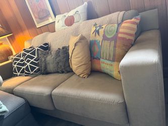 Amazing clean couch no pets or tears small in back of couch no stains no pets 250 need gone asap