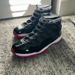 Black Jordan 11’s Size 10