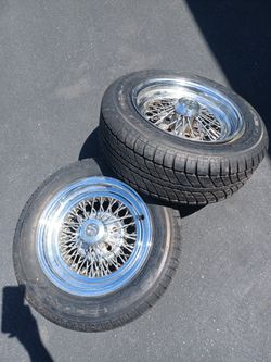 (2) 14" wire wheels and tires ( Mercedes)
