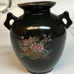 Chinese 4.25” black 2 handle vase  lavendar pink purple flowers deep red lotus in rickshaw  gold trim  Original tag on bottom Made in Taiwan