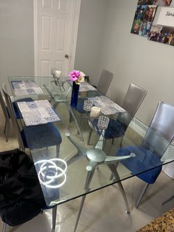 Modern glass table with 8 chairs
