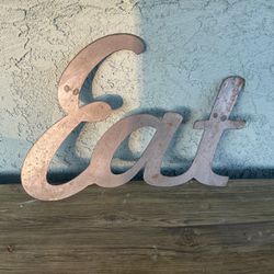 Metal “Eat” Sign