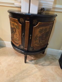 Bar cabinet / accent cabinet.
