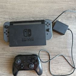 nintendo switch, controller, and games
