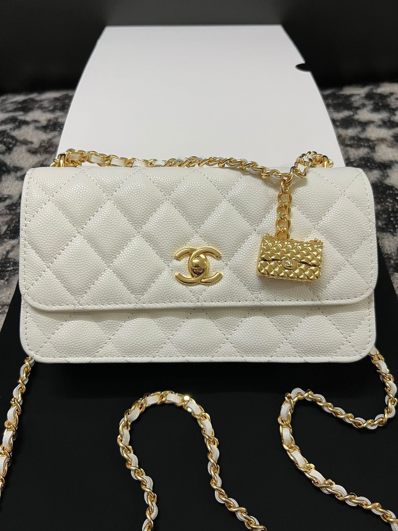 Chanel 23s Caviar clutch with chain & charm